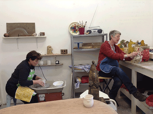 teacher and pupil working in the studio